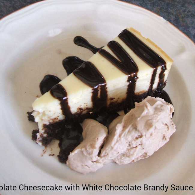 White Chocolate Cheesecake with White Chocolate Brandy Sauce